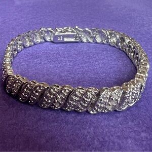 Sterling Silver and Diamond Bracelet with safety clasp